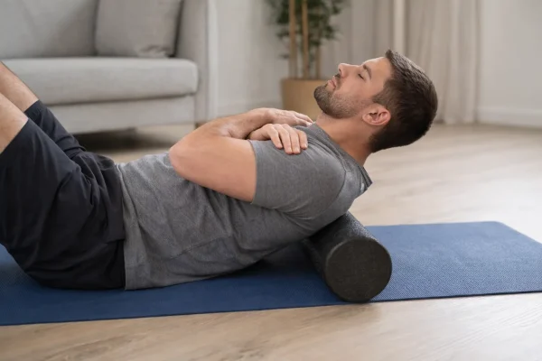 Upper back stretch with foam roller