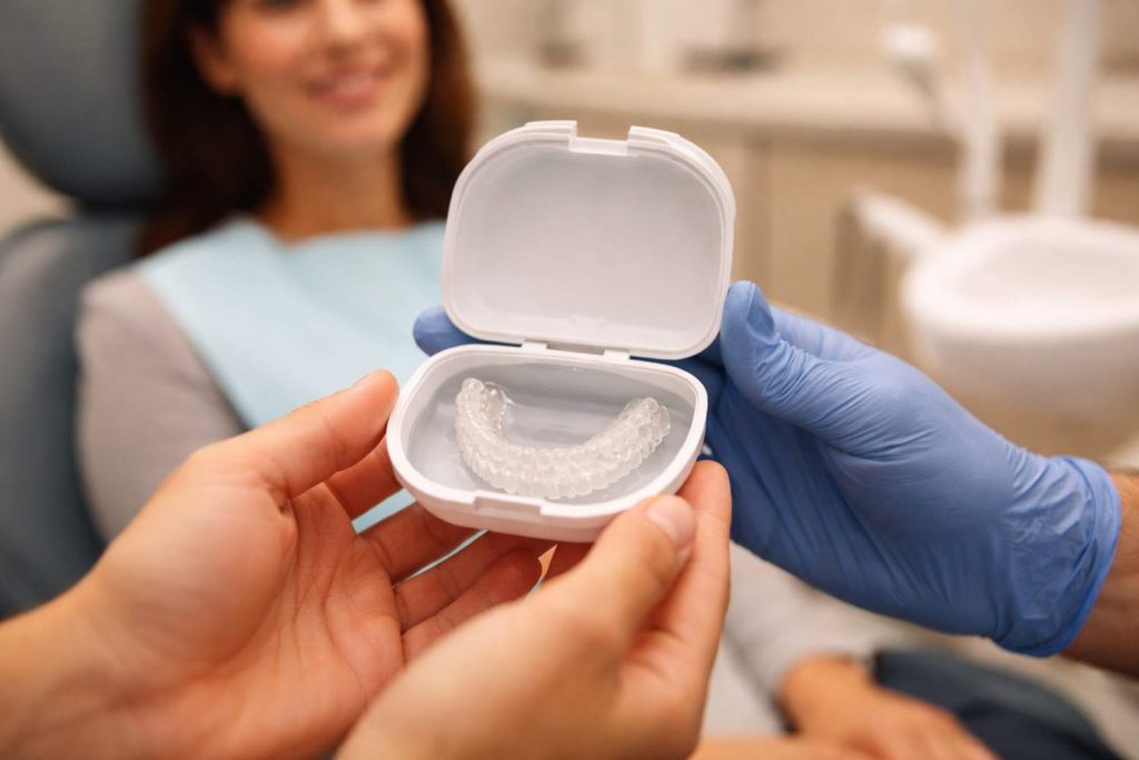 How A Custom Night Guard From A Dentist In Selkirk Can Improve Your Comfort